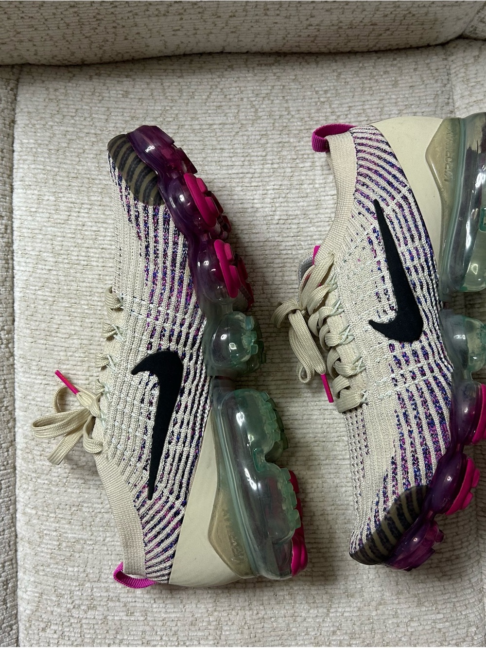 Nike Women’s Beige Flyknit VaporMax Sneakers with Purple and Pink Accents